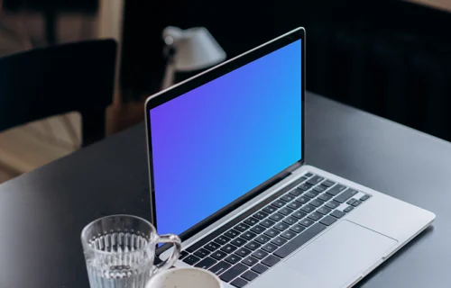MacBook Pro mockup on a black table