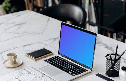 MacBook Pro mockup on a marble work table
