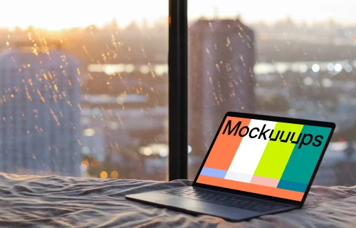 MacBook Pro mockup on bed