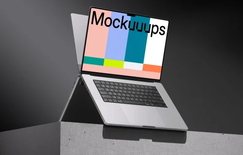 MacBook Pro Mockup on minimalist ledge against dark background