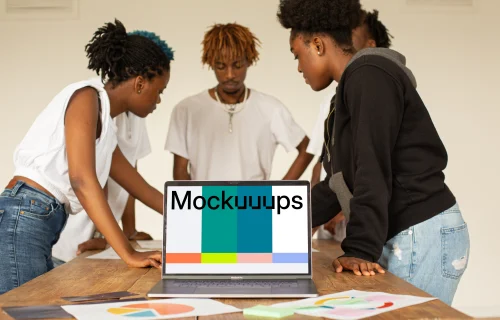 MacBook Pro mockup placed on a conference table