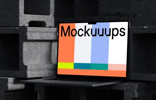 MacBook Pro mockup placed up on concrete blocks