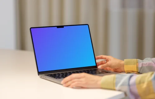 MacBook Pro Mockup with Female Hand on a Modern Desk