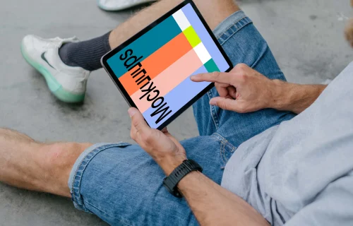 Male hand typing on an iPad Air mockup
