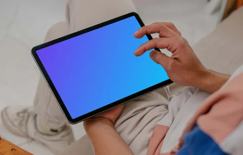 Male hands working on iPad Air mockup