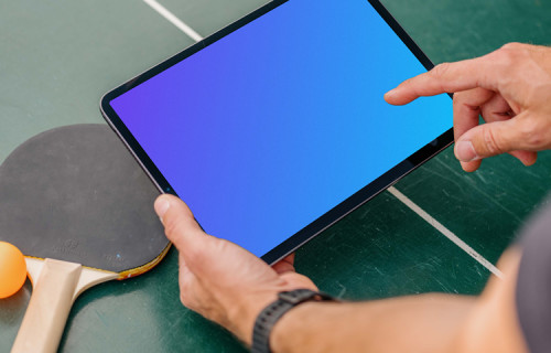 Man pointing on an iPad mockup