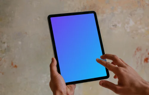 Free mockup of man pointing on iPad