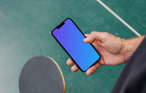 Man typing on an iPhone 13 mockup