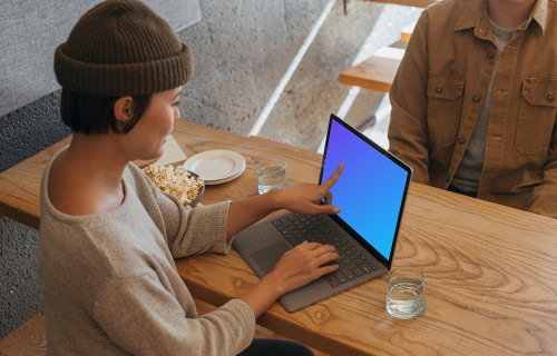 Microsoft Surface Laptop mockup table on a wooden table