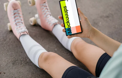 Person holding a phone mockup