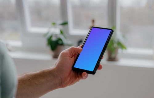 Person holding a Pixel 6 mockup