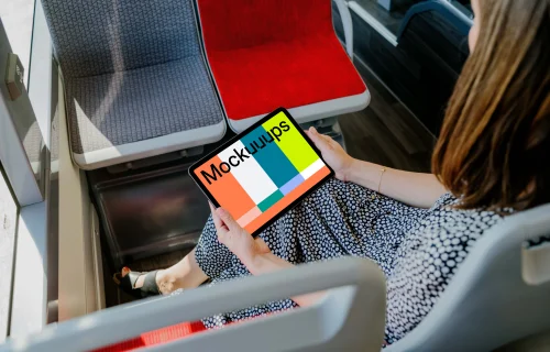 Person reading on an iPad Air mockup
