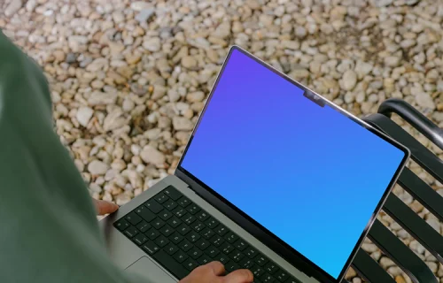 Person working on MacBook Pro mockup