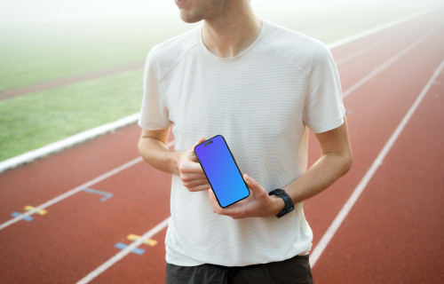Runner holding iPhone 14 Pro