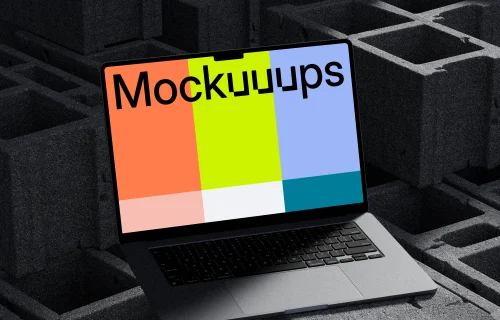 Sleek MacBook Pro displayed on industrial concrete blocks