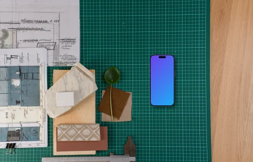 Smartphone mockup on architect's table