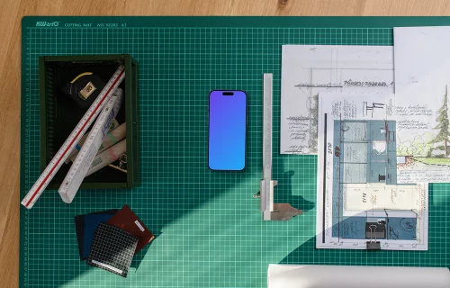 Smartphone mockup with architectural plans and tools