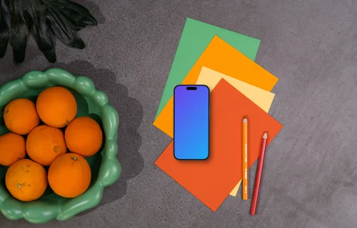 Smartphone mockup with colorful stationery and decor