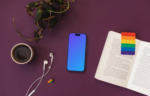 Smartphone mockup with headphones and LGBT decorations