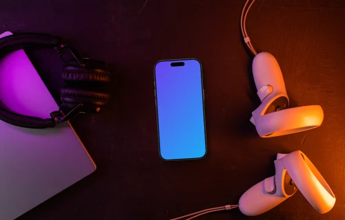 Smartphone mockup with headphones and VR headset