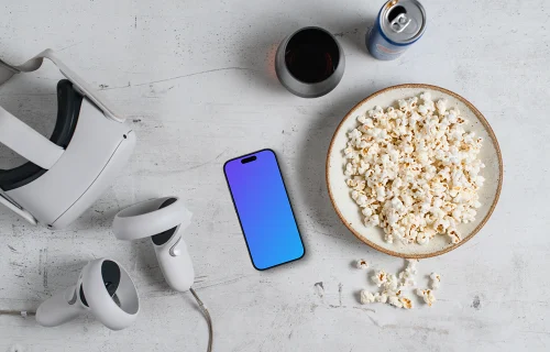 Smartphone mockup with VR headset and gaming accessories