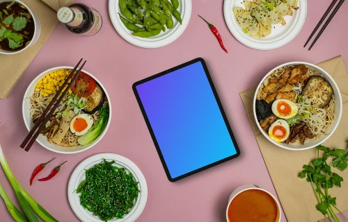 Tablet mockup between Japanese food