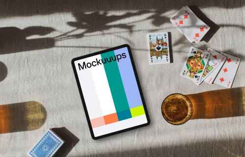 Tablet mockup in the middle of Joker cards