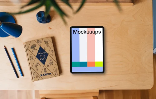 Tablet mockup on a child's wooden desk