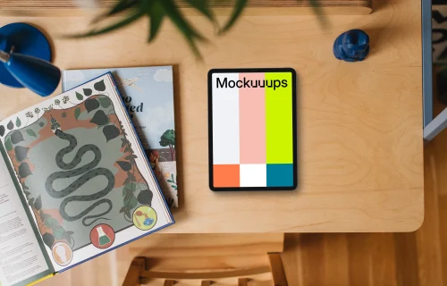 Tablet mockup on kid-friendly creative table