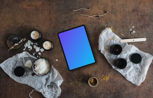 Tablet mockup on the table with christmas decoration