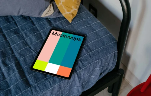 Tablet mockup placed on a bed