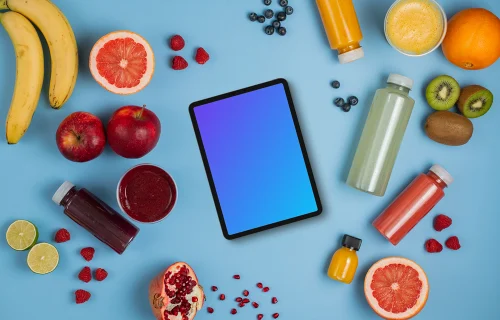Tablet mockup surrounded by juices