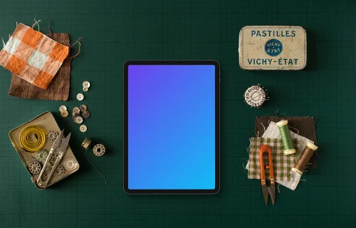 Tablet mockup with fabrics on the side