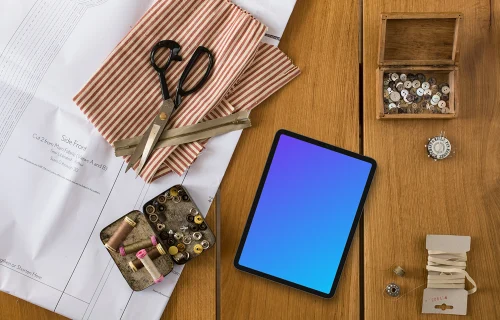 Tablet mockup with sewing scissors on the side