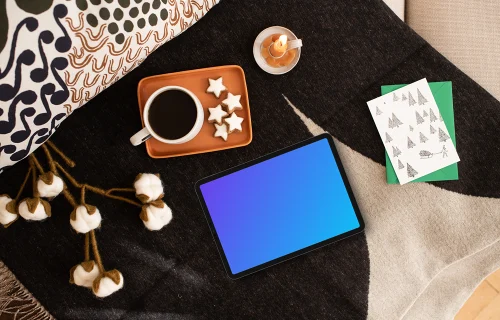 Top view of tablet mockup with Xmas design