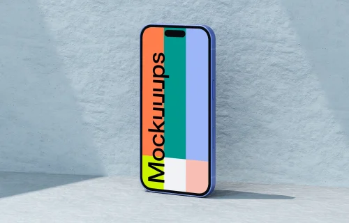 Ultramarine iPhone 16 mockup standing against a textured wall