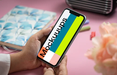 User holding an iPhone 11 mockup
