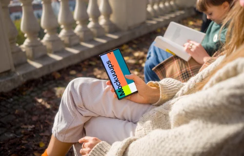 Woman hand scrolling on a phone mockup