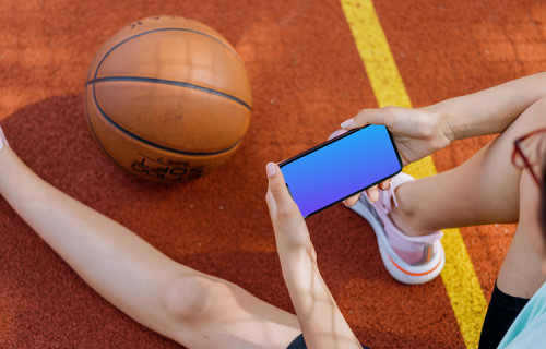 Woman hands holding an iPhone 13 mockup