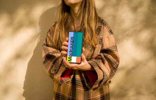 Woman holding a Google Pixel 6 mockup