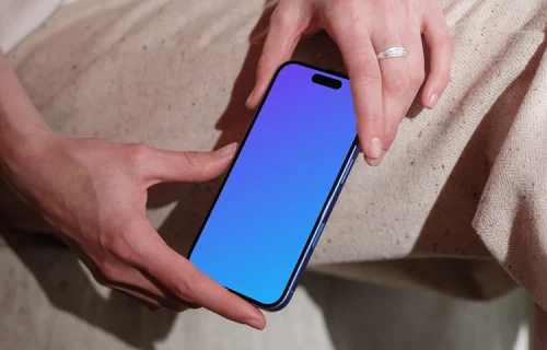 Woman holding iPhone 16