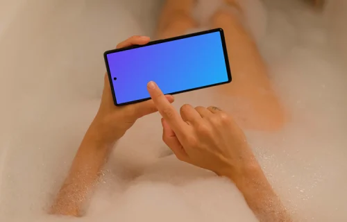 Woman in bath typing on a Google Pixel 6 mockup