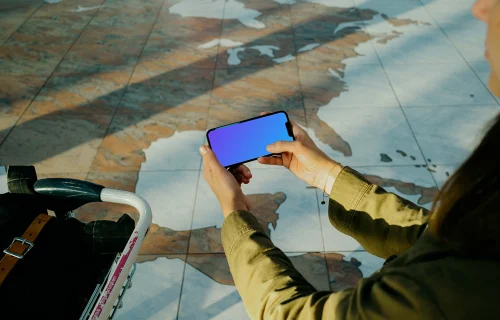 Woman scrolling on an iPhone mockup