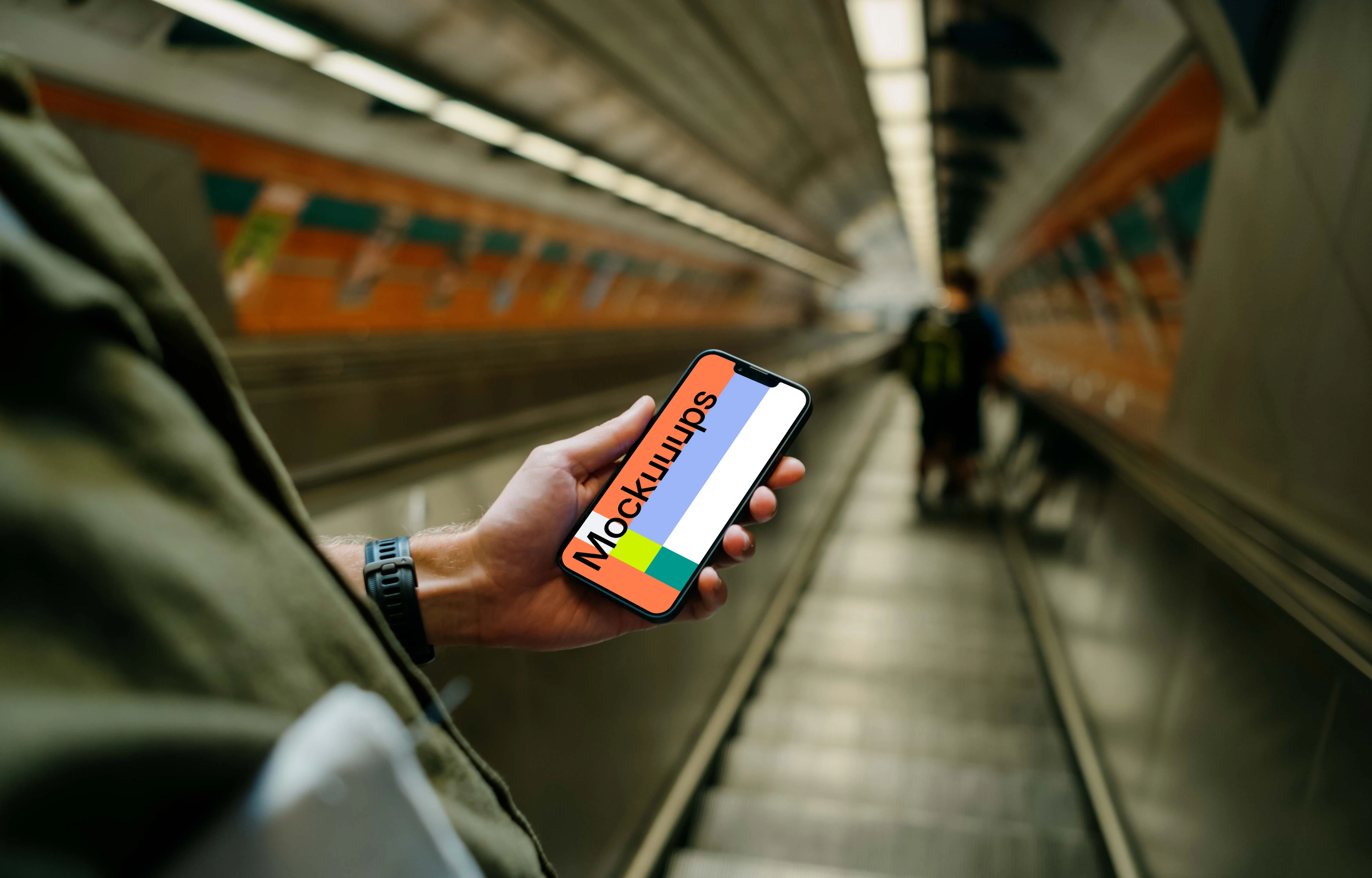 Hand holding a phone mockup