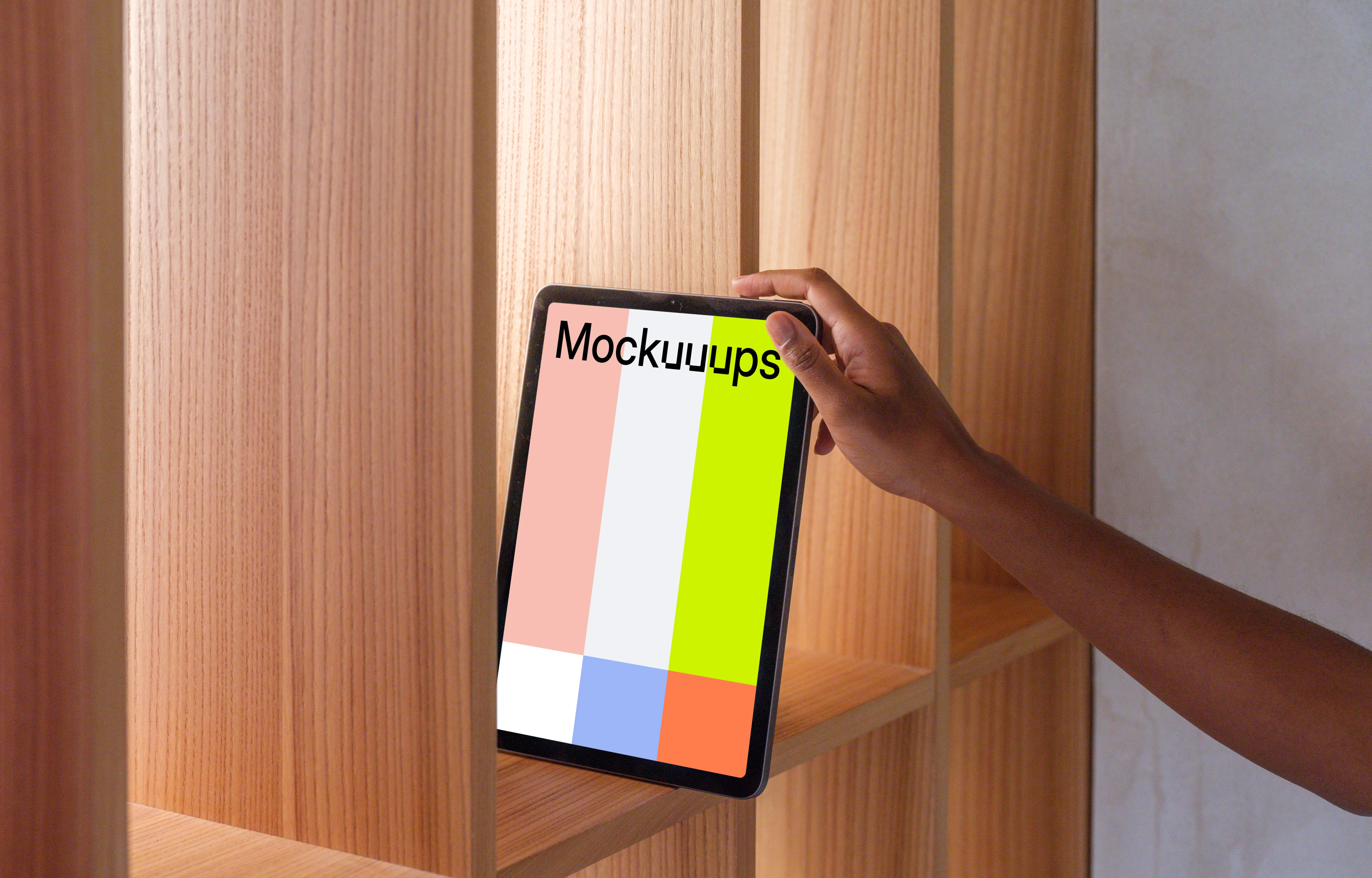 iPad Air mockup held against a wooden shelf