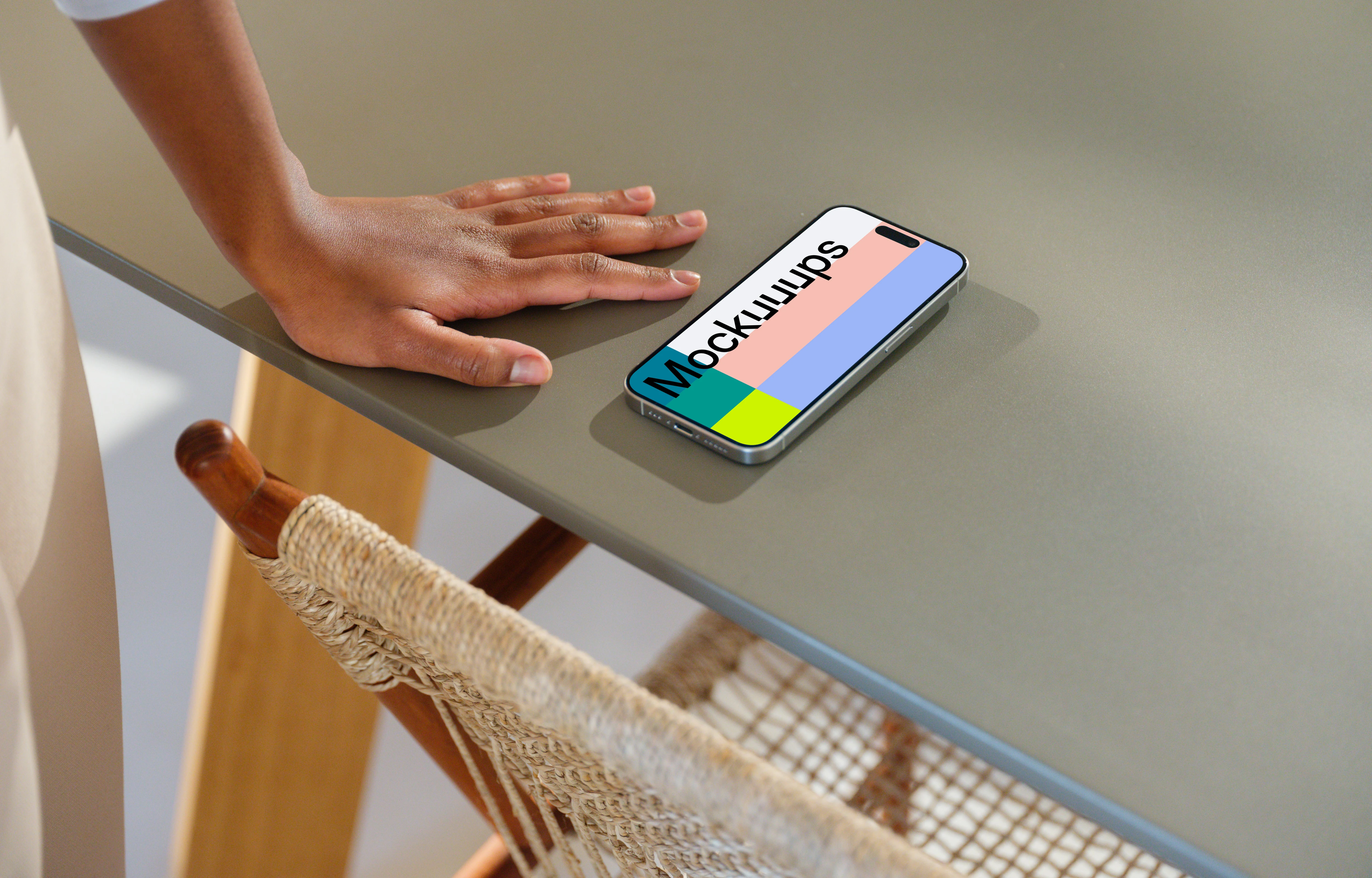 iPhone 15 Pro mockup on a modern office desk