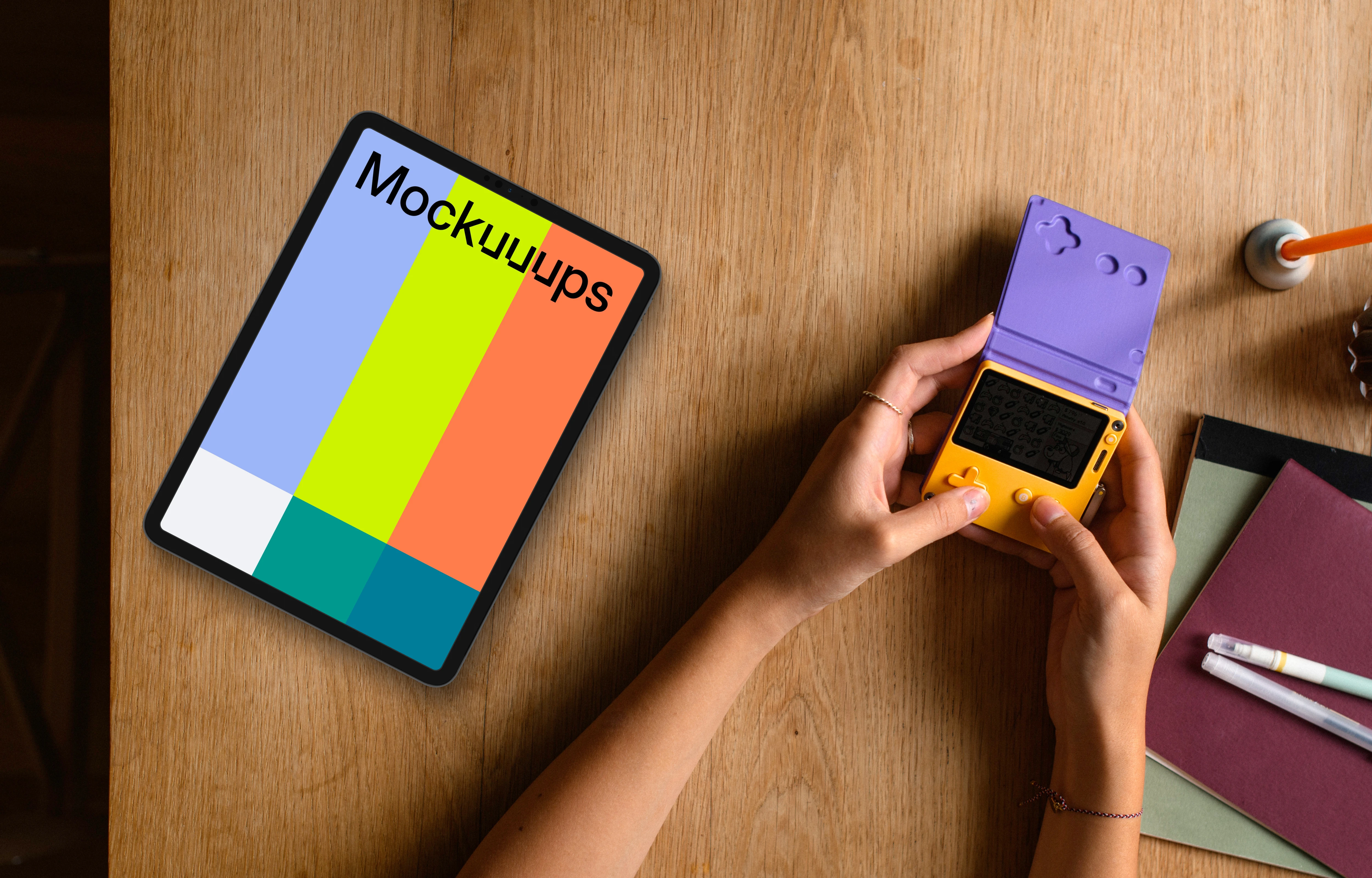 Tablet mockup on a wooden desk with gaming device