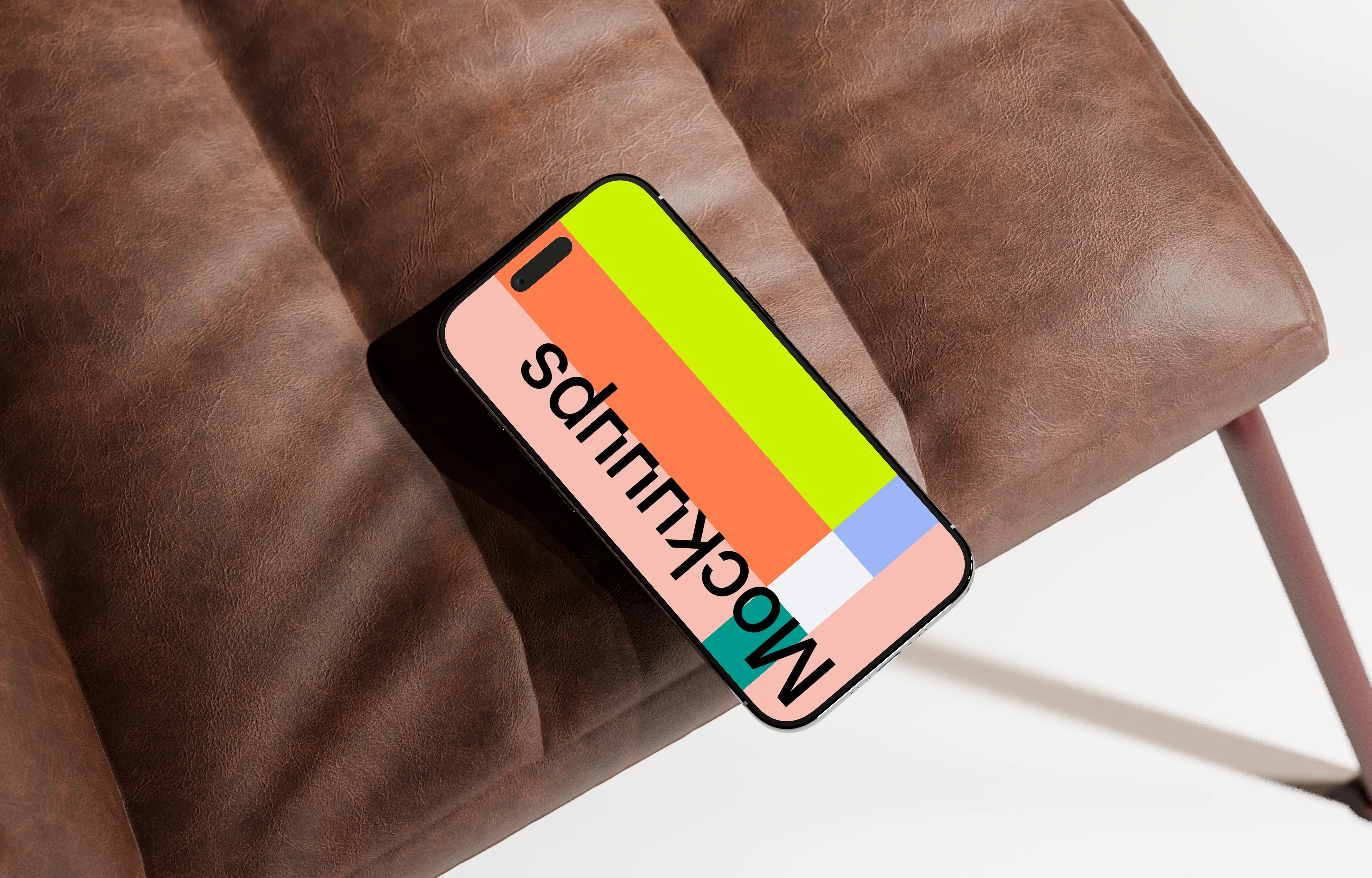 iPhone Air mockup on a brown leather chair