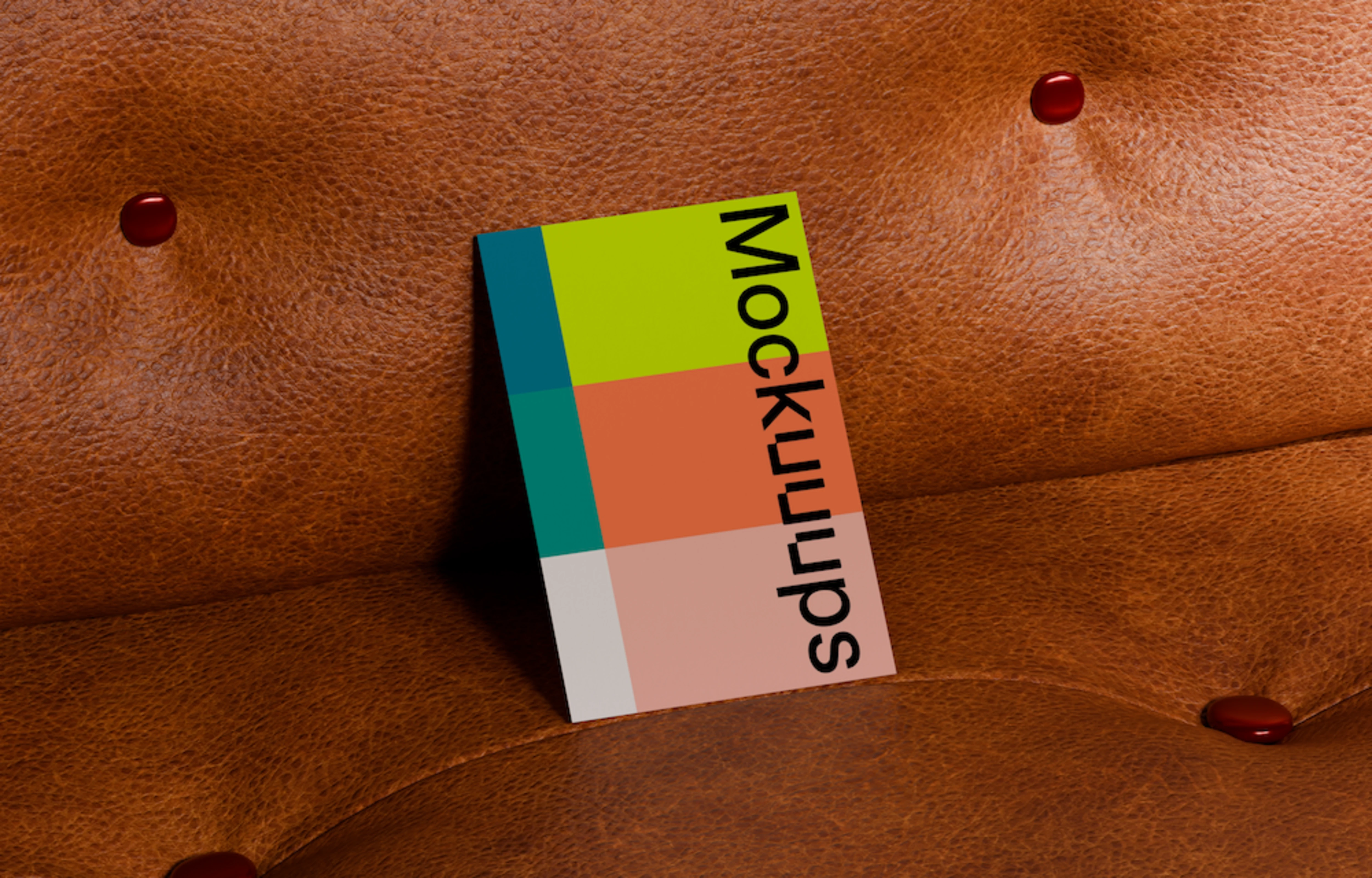 Business card mockup on a textured leather couch