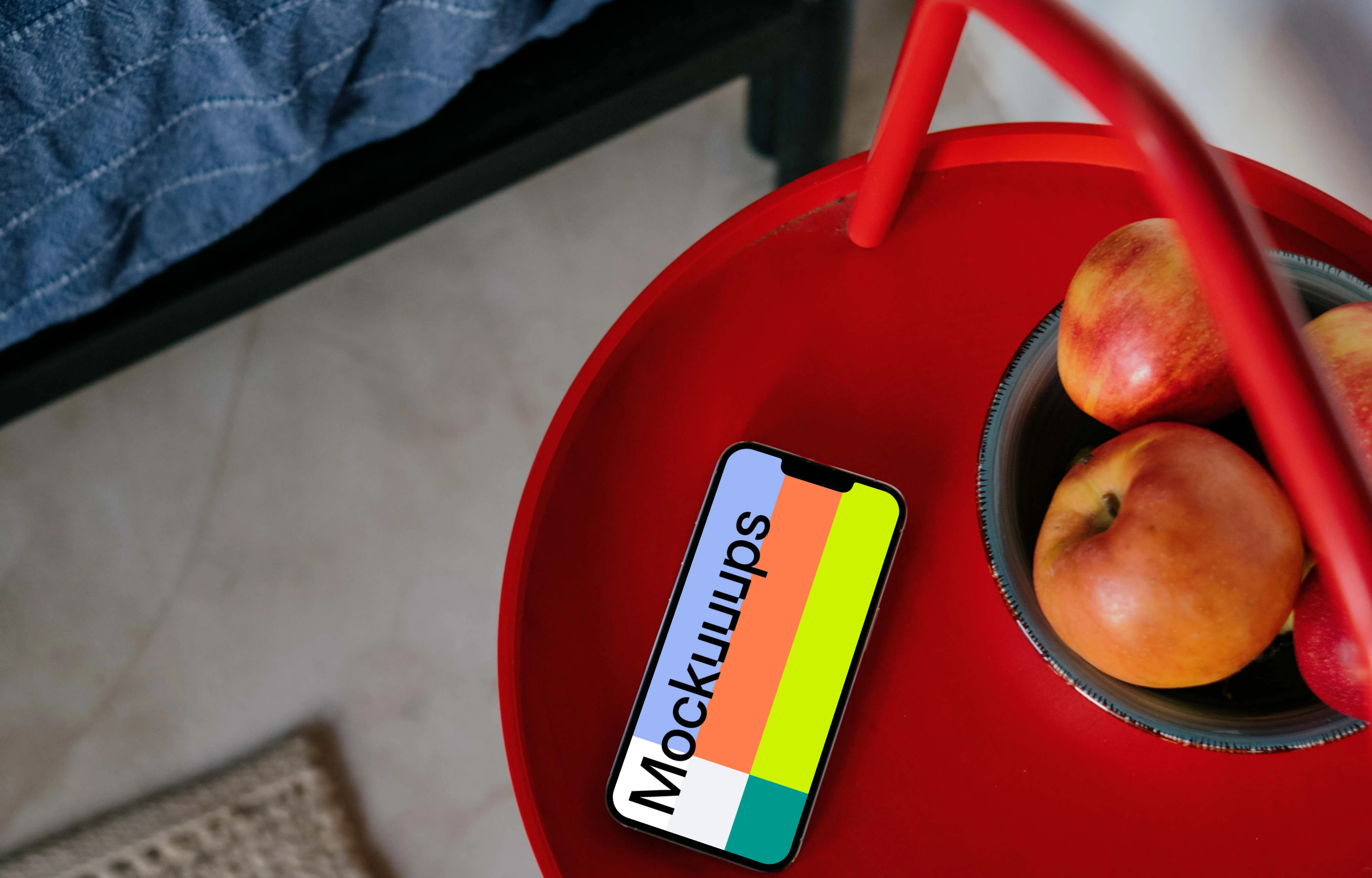  iPhone 13 Pro mockup placed next to a fruit bowl